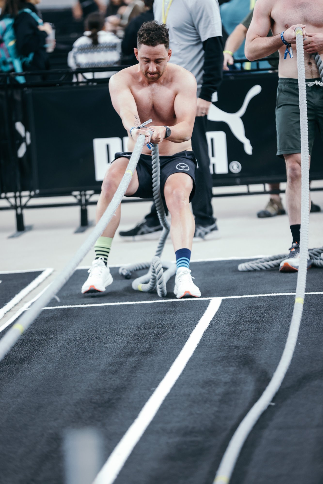 Joe Lewis Hyrox coach Colorado — farmers carry at Hyrox competition